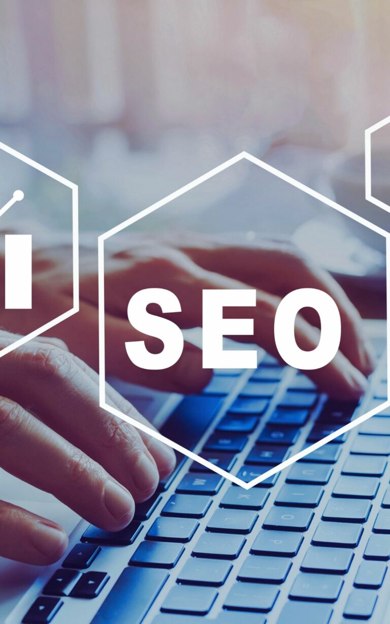 Boise small business owner working on laptop with SC Solutions providing local SEO, cybersecurity, and digital marketing support